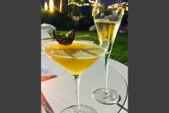 Cocktails & champagne under fairy lights at the front of the chateau by the pool