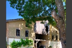 The old stables and outbuildings next to the chateau