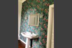 Hand painted wallpapers and traditional bathroom suites