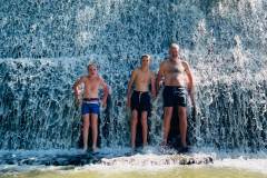 Guests cool off at the chateau waterfalls on a hot summer’s day
